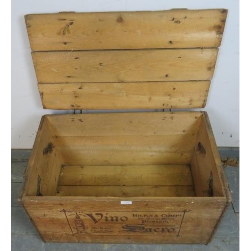 853 - An antique wine crate stencilled ‘Vino Sacro Hicks & company of Plymouth’ with braided rope handles ... 