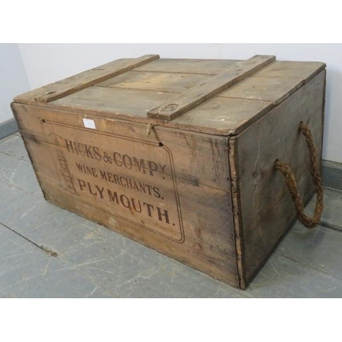 854 - An antique wine crate stencilled ‘Hicks & company wine merchants, Plymouth’ with braided rope handle... 