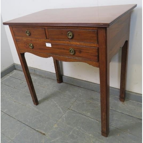 861 - An Edwardian Georgian Revival mahogany lowboy by Spillman & Co, with reeded edge, housing two short ... 