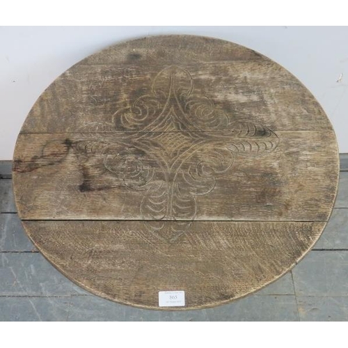 865 - An 18th century and later oak cricket table, on tapering square supports (a/f). 
H57cm Diameter 61cm... 