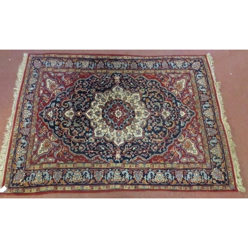 904 - Persian rug japer central motif padsso foliage in blues and reds. 180cm x 130cm.
Condition report: A... 