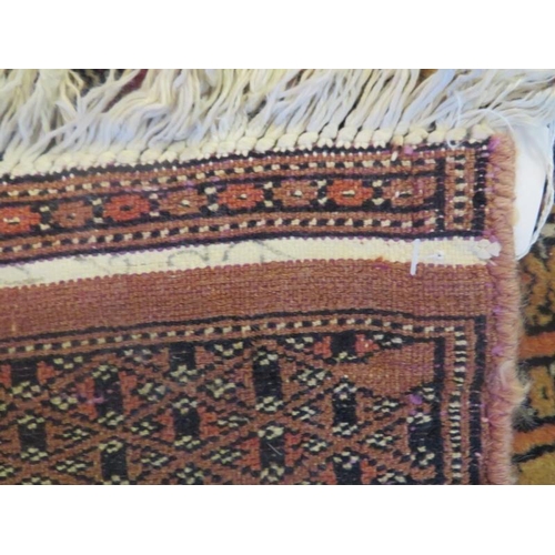 907 - Kannchi rug, central gills within multi borders, reds and browns, with certificate. 175cm x 122cm.
C... 