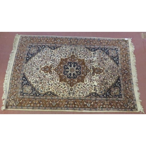 911 - Persian rug Tabriz in browns and beige central motif upon floral panel blue ground corners within bo... 