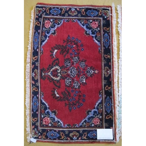 930 - A fine pair of unused Mehraban (Hamadan region) mats. Ruby field with vase of flower motif and styli... 