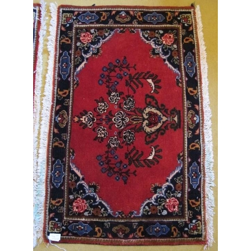 930 - A fine pair of unused Mehraban (Hamadan region) mats. Ruby field with vase of flower motif and styli... 