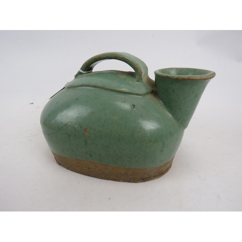 101 - An Asian Celadon ceramic pouring vessel, possibly Korean Choson, 23 cm long.