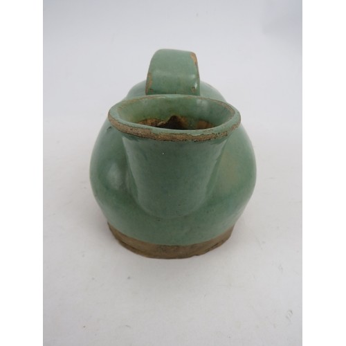 101 - An Asian Celadon ceramic pouring vessel, possibly Korean Choson, 23 cm long.