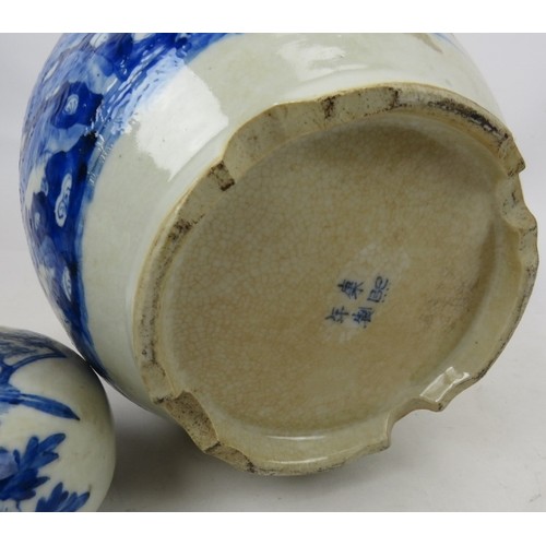 63 - A 19th century Chinese blue and white crackle ware porcelain vase and cover in the Kangxi style pain... 