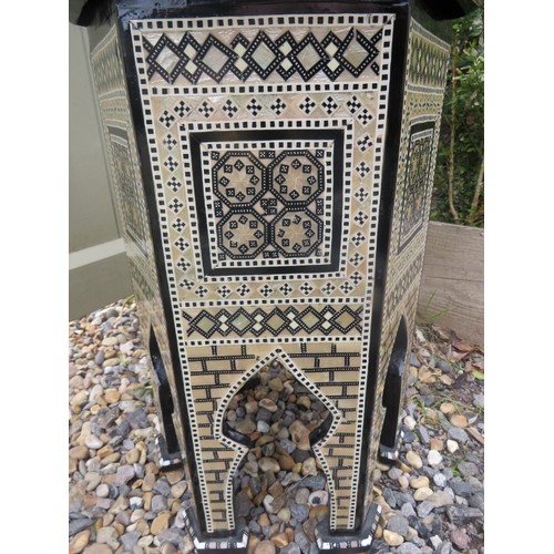 712 - A highly decorative Moorish octagonal occasional table, with mother of pearl and bone geometric inla... 