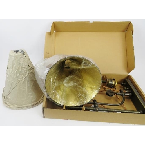 103 - Matching lamp to lot 102, boxed with two shades. 
Condition report: New, damage to screw fitting to ... 