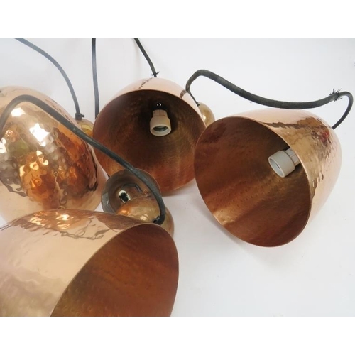 109 - Four copper lamp shades, dome beaten design with matching fittings, each 8