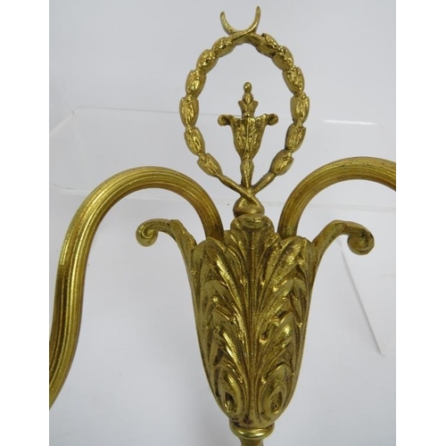 11 - A pair of Neo Classical revival cast gilt-metal twin-branch wall lights. 9.1 in (23 cm) height. 
Con... 