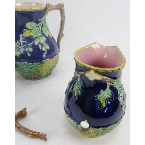 114 - Set of three Majolica Blackberry pattern jugs in graduated sizes. Largest 8