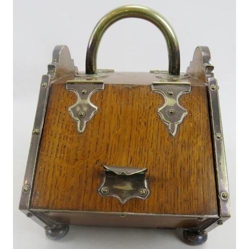 118 - A Victorian double compartmented biscuit box. The miniature oak box of coal scuttle form with metal ... 