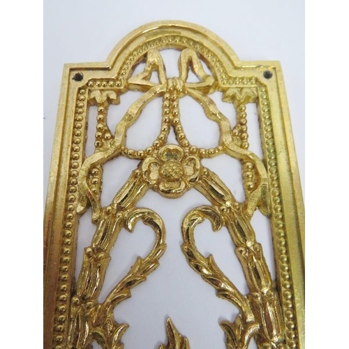 12 - A set of ten Neo Classical revival cast and pierced gilt-metal door finger plate push plates. Each a... 