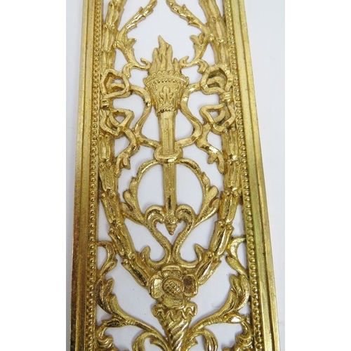 12 - A set of ten Neo Classical revival cast and pierced gilt-metal door finger plate push plates. Each a... 