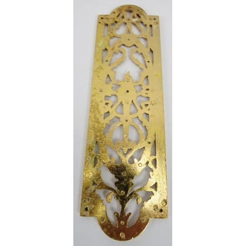 12 - A set of ten Neo Classical revival cast and pierced gilt-metal door finger plate push plates. Each a... 