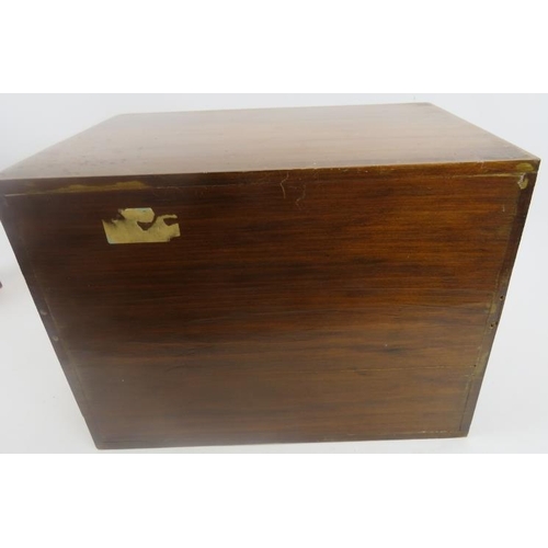 120 - Table top chest. With four graduated drawers, stained beach and plywood. 10.5 x 14 x 9 3/4 deep. Bur... 