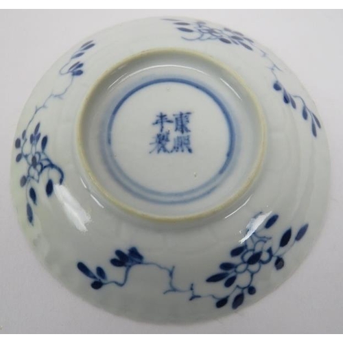 16 - Four Chinese blue and white porcelain items, 19th century. Comprising three dishes and a cup. 8.3 in... 