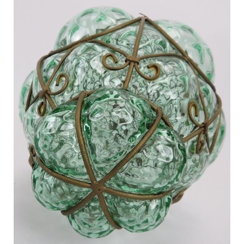 33 - An Italian Seguso Murano glass pendant lamp, circa 1960s. Hand blown into a wire cage with pale gree... 