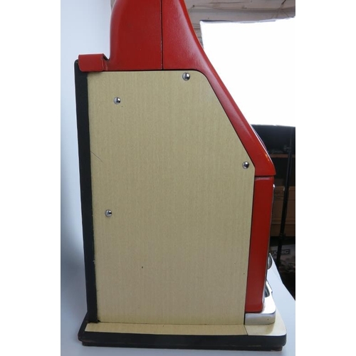 49 - An original vintage Mills three drum one arm bandit slot machine. Red and cream with chrome mounts. ... 