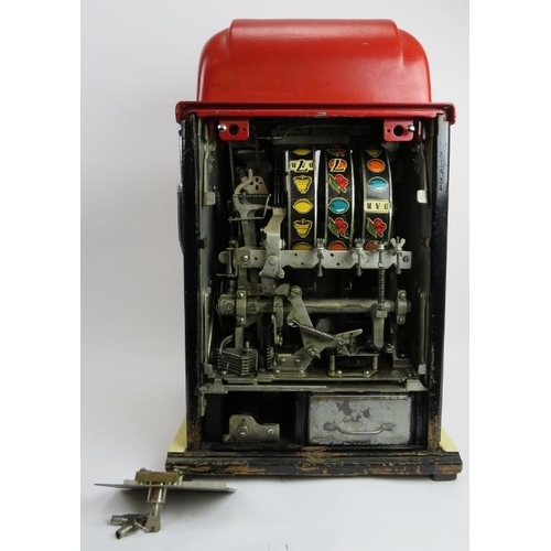 49 - An original vintage Mills three drum one arm bandit slot machine. Red and cream with chrome mounts. ... 