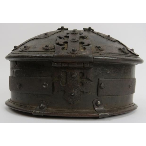 50 - A rare Continental iron clad wooden table casket, 16/17th century. Of oval form with a domed hinged ... 