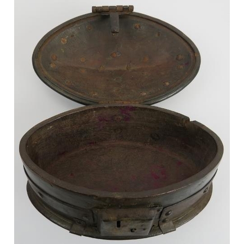 50 - A rare Continental iron clad wooden table casket, 16/17th century. Of oval form with a domed hinged ... 