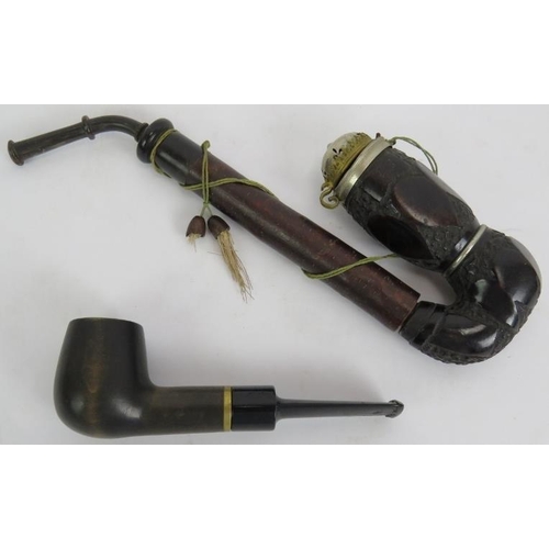 56 - An ornate Edwardian mahogany pipe rack, a cast brass aesthetic movement pipe rack and two tobacco pi... 