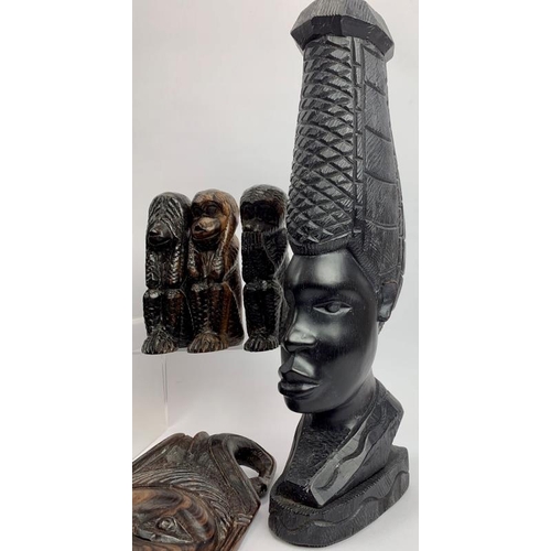 57 - Collection of African carved figures and heads. Assorted hard woods and zebra skin drum, 16cm height... 