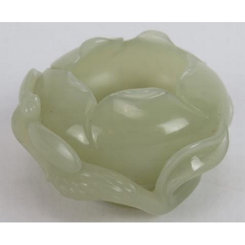 74 - A Chinese carved celadon Jade brush washer, of intricate organic naturalistic form, with leaf and fl... 