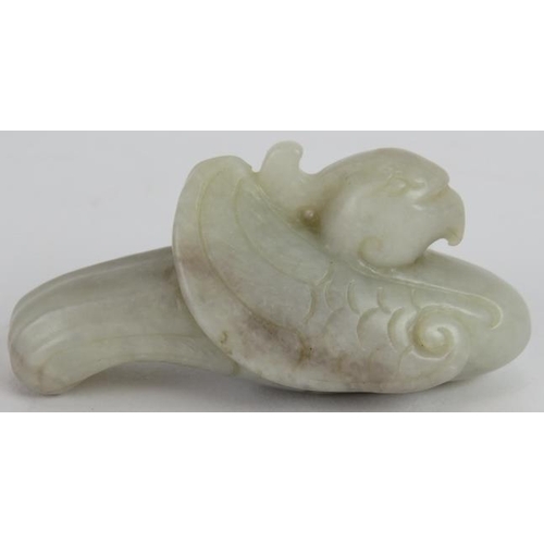 78 - A Chinese carved pale celadon Jade Phoenix, Ming style but likely Qing, 8cm long x 4cm high.
Provena... 