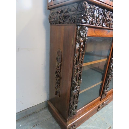 702 - A good quality Victorian rosewood mirror-back chiffonier featuring barley-twist uprights and an abun... 