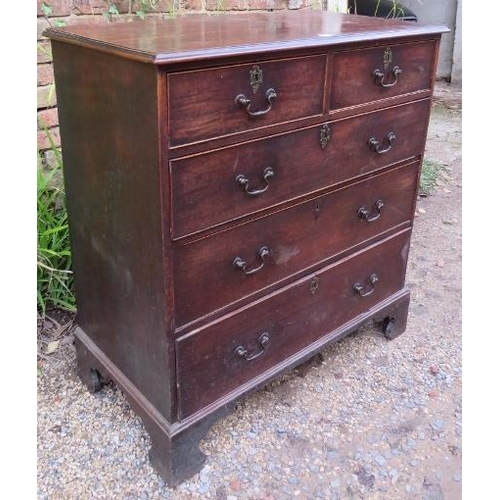 707 - An 18th century mahogany straight-front chest of two short over three long graduated cock-beaded dra... 