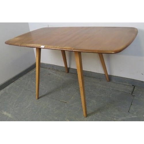 736 - A mid-century ‘Windsor’ elm and beech drop-leaf dining table, on canted supports. 
H71cm W61-136cm D... 