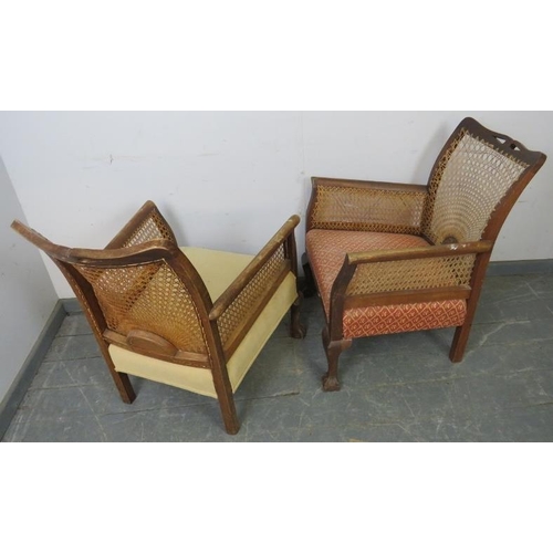 753 - A pair of 1920s walnut his & hers bergère armchairs, on cabriole supports with claw & ball feet. 
H8... 