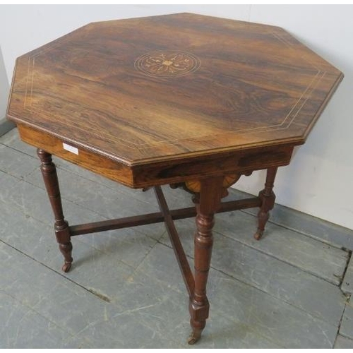 755 - An Edwardian rosewood octagonal occasional table, with marquetry inlay, on tapering supports with an... 