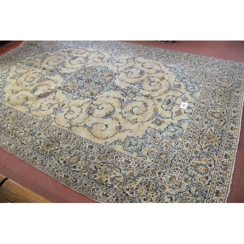 925 - A good Persian Kashan carpet, pale blue ground central motif with scrolls. 354cm x 245cm.
Condition ... 