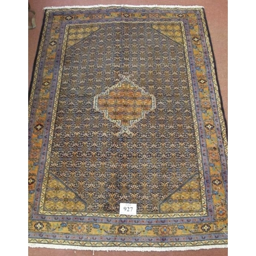 927 - A good Persian Tabriz rug, with central motif on a patterned field, pastel blue-yellow-cream. 197cm ... 