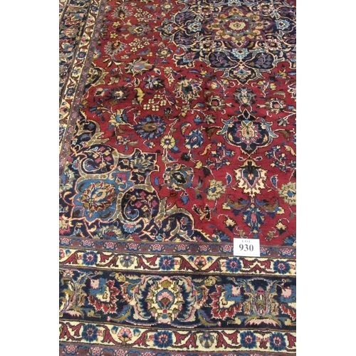 930 - A superb Persian Meshed carpet, central motif, blue on red ground with flowers and foliage. 345cm x ... 