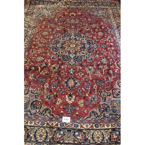 930 - A superb Persian Meshed carpet, central motif, blue on red ground with flowers and foliage. 345cm x ... 