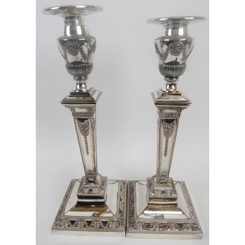 251 - A pair of good quality silver plated Adams revival candlesticks, 19th century. With weighted bases, ... 