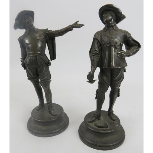 253 - After E. Guillemin (1841-1907) pair of silver plated bronze standing musketeers. Impressed name to c... 