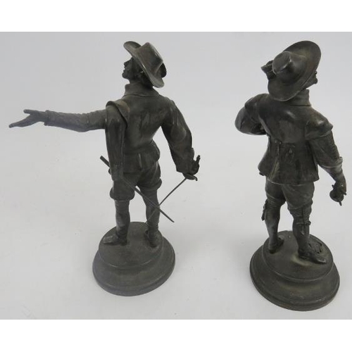 253 - After E. Guillemin (1841-1907) pair of silver plated bronze standing musketeers. Impressed name to c... 