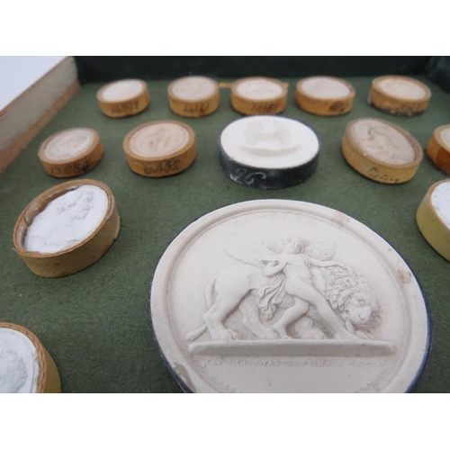 259 - A large collection of Italian Grand Tour Plaster Intaglios. Displayed in two trays, each tray with h... 