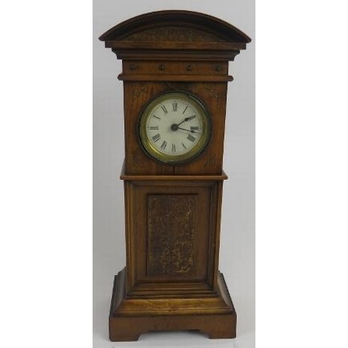 266 - Miniature long case clock, walnut, traces of gilding to etched panel, not tested, 18cm height. 
Cond... 