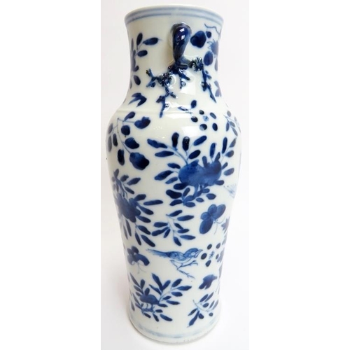 100 - A Chinese blue and white porcelain twin handled vase, 19th century. The twin handles with blossoming... 