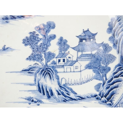 106 - A Chinese Export blue and white porcelain charger, 18th century, Qianlong period. Decorated to the c... 