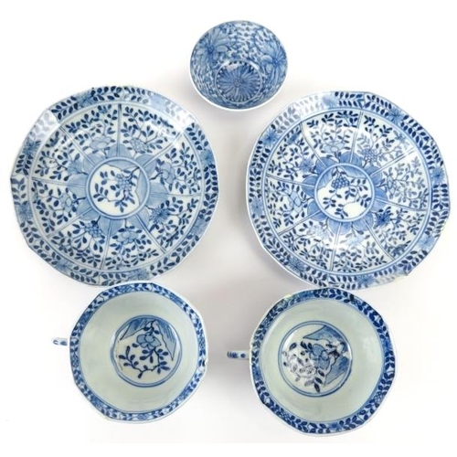 111 - A group of Chinese blue and white porcelain items, 19th century. Comprising a pair of teacups and sa... 