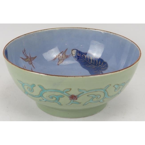 121 - A Japanese Arita bowl, late Meiji/Taisho period. Unusually decorated with birds in a naturalistic se... 